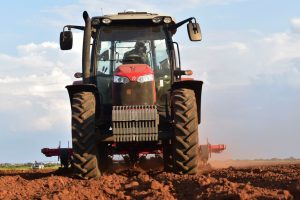 Louis van der Walt's MF 6713 R tractor has been adapted to fit perfectly between the rows of his potato fields without touching the high banks.