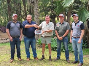 Ryan Clark, AGCO Product Marketing Manager; Lenard Lingenfelder, Area Manager; Louis van der Walt, farmer; Hannes van Deventer, Dealer Principle of Trophy Tractors; and Robert Keir, AGCO Marketing Specialist.