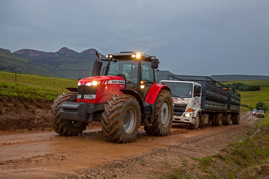 MF 7618 pulling a truck